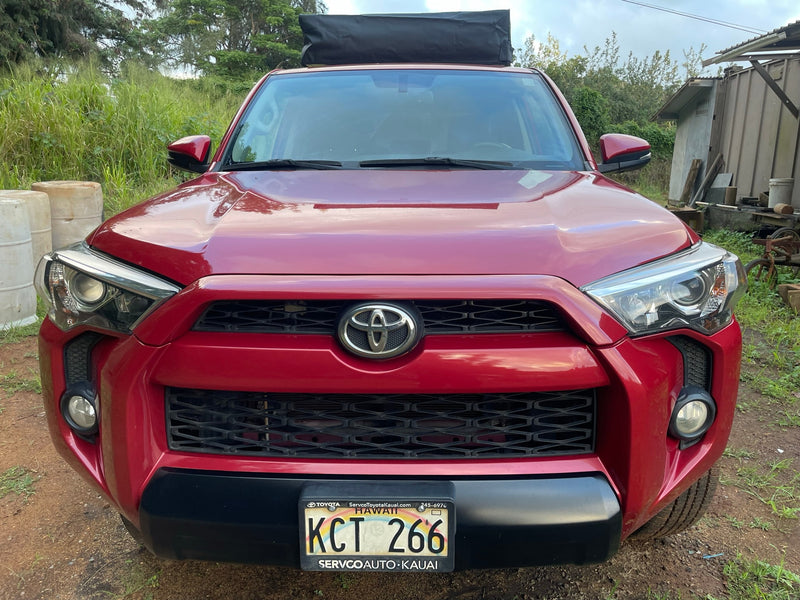 Front view: Red Toyota SUV with roof cargo bag, Hawaii plate KCT 266. Great for an rv rental road trip. — photo 5