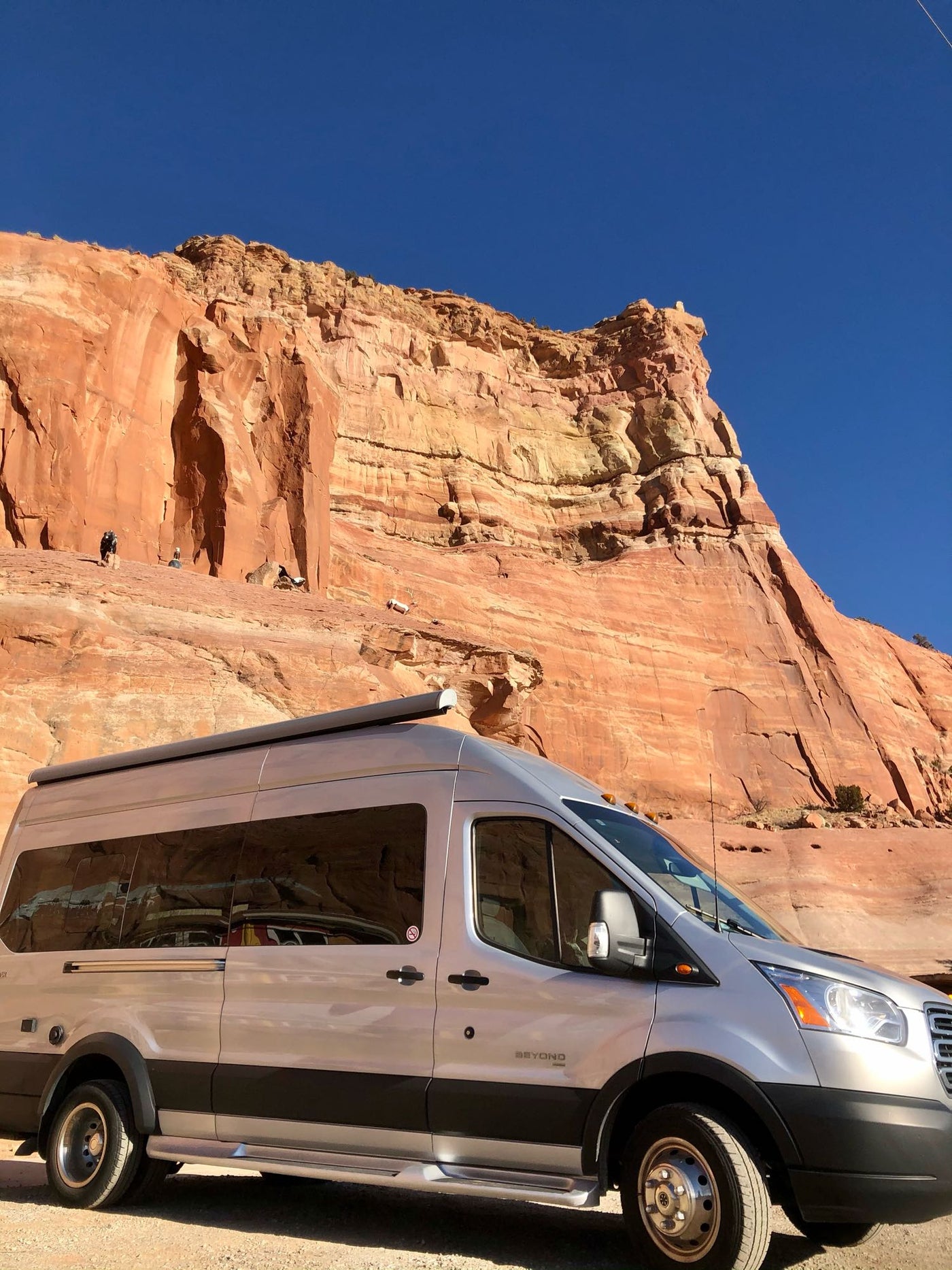  parked in a scenic California spot.|A sleek silver RV rental — photo 2