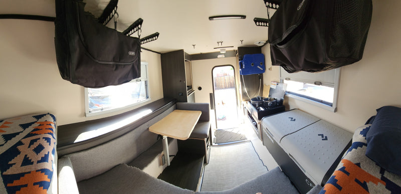  and smart storage for adventures.|Experience comfort in this RV rental's sleeping loft — photo 12