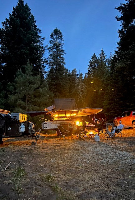  ready for RV rental adventure trips.|A white off-road camping trailer with a rooftop tent