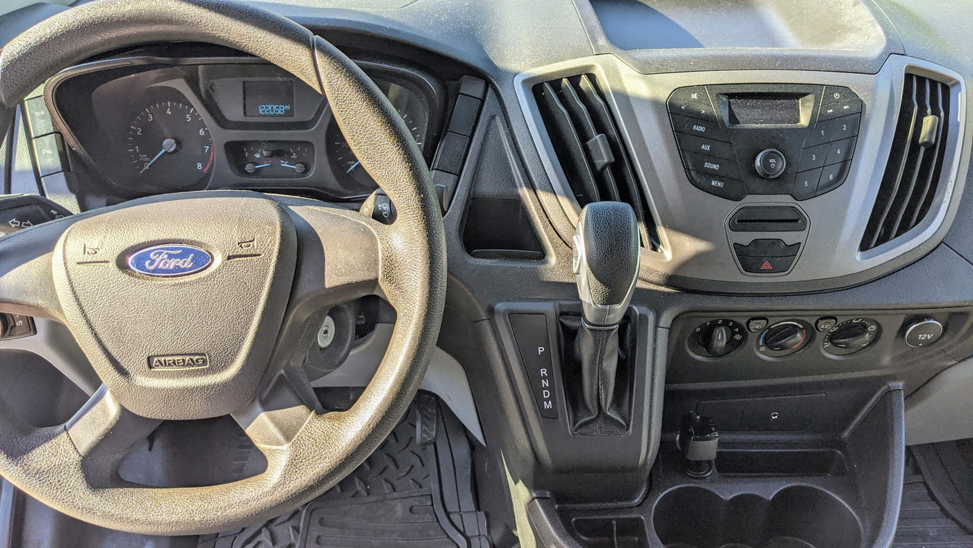 ready for adventure.|Dashboard view inside a Ford van — photo 4