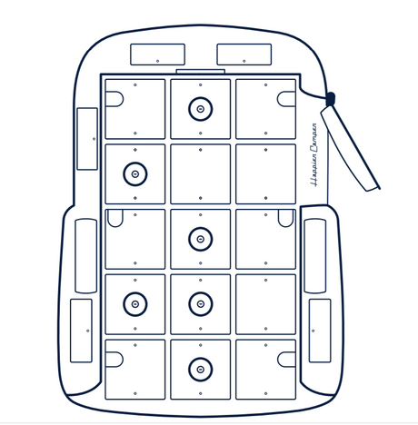 Top-down view of a Happier Camper RV rental interior, showing its modular layout with square components, some with circular features and U-shaped cutouts.