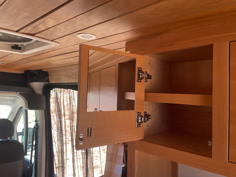  all built with warm wood.|Experience stunning ocean views from this cozy RV rental's custom wood interior — photo 8