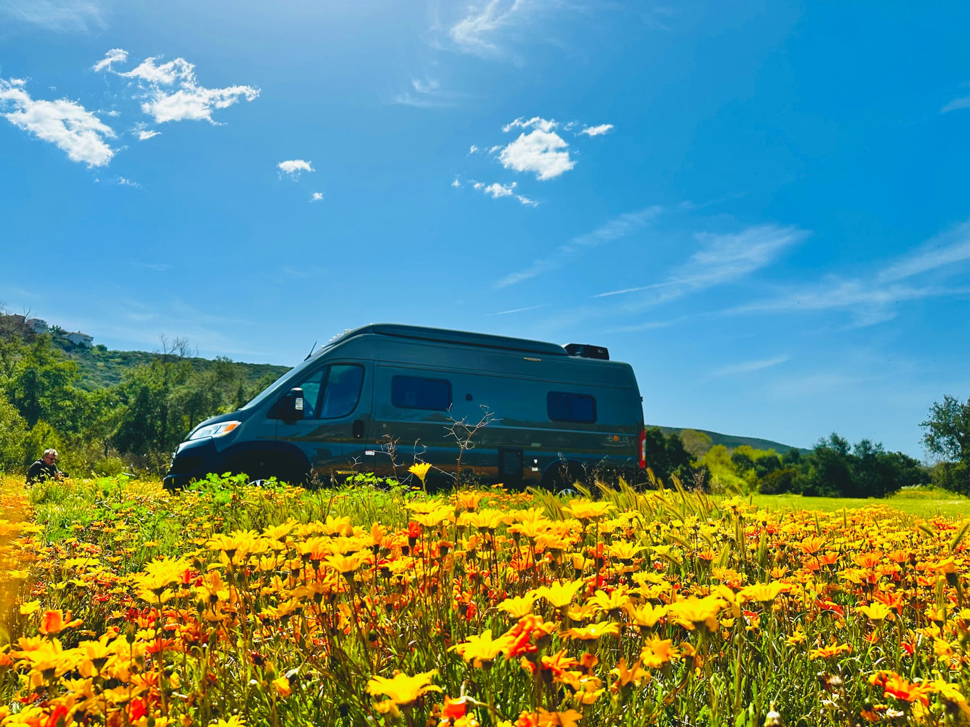  parked outdoors.|This gray pop-top camper van — photo 2