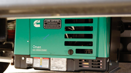 This Cummins Onan QG 2800i EVAP generator, essential for an RV rental, provides reliable portable power.