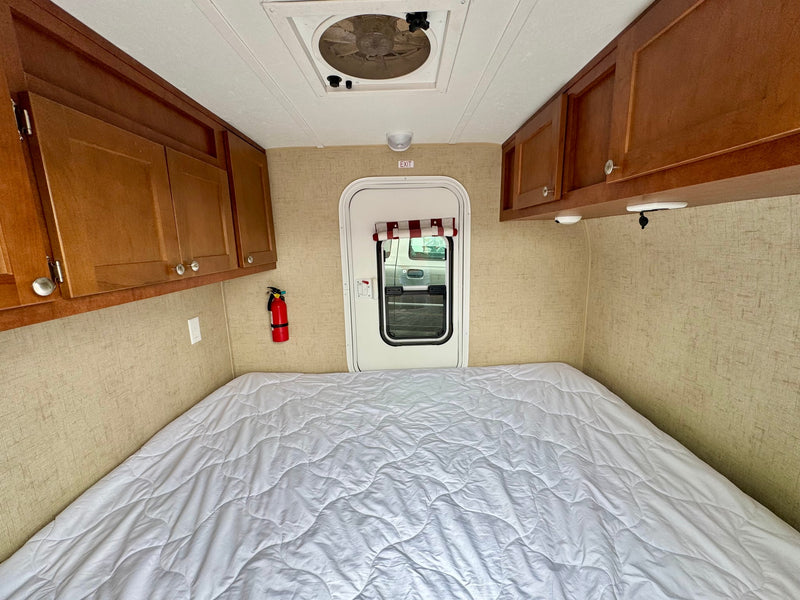  parked on asphalt.|White and red Retro Jr. compact rv rental — photo 4