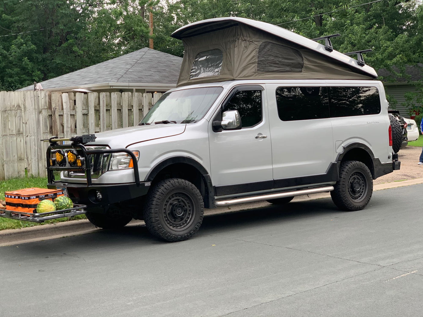  equipped with a pop-top camper & off-road gear