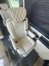 Plush quilted captain's chair inside a premium RV rental, offering luxurious comfort for your next journey.