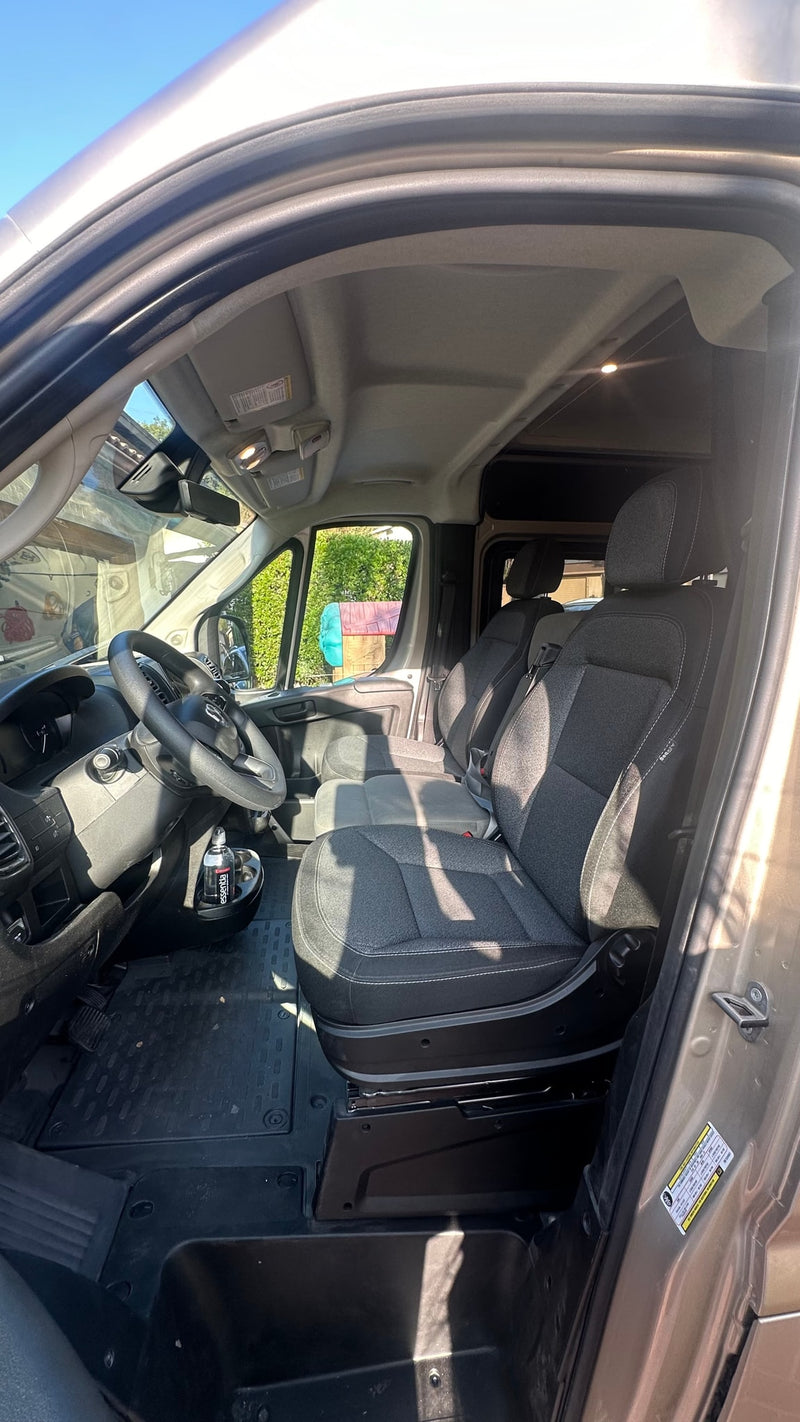  and a compact kitchen sink on the right.|Explore this RV rental's cozy interior: bed — photo 16