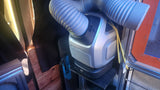 RV rental interior showing a portable AC unit with dual hoses, mounted for climate control within the camper van.
