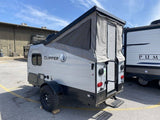 This compact Clipper pop-up travel trailer, great for rv rental, offers off-road camping adventures.