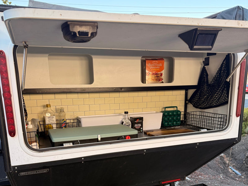  and a portable AC unit. Great for adventures.|RV rental outdoor kitchen with a portable stove — photo 4