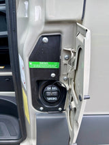 RV rental's open fuel door reveals the diesel filler cap & a warning: Ultra-low sulfur diesel fuel only, max B20.