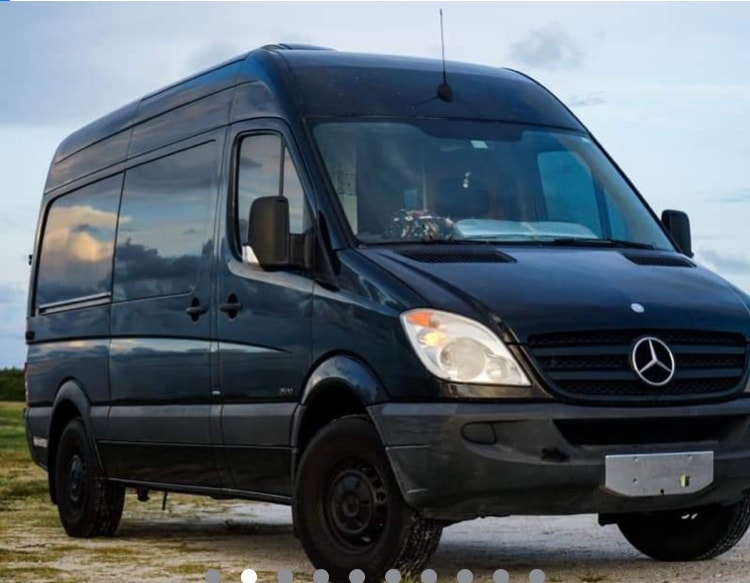 Rugged black Mercedes-Benz Sprinter van