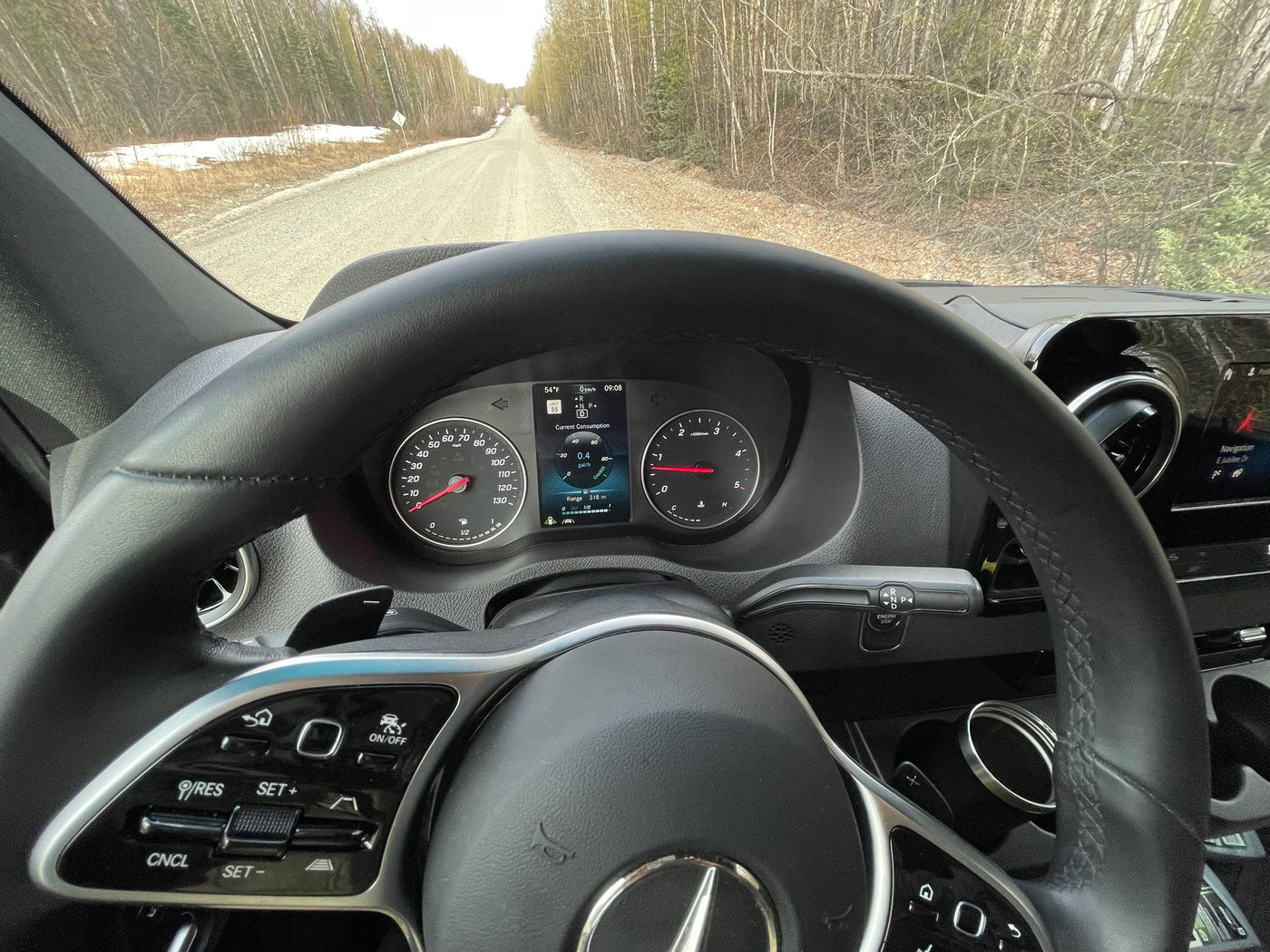  parked on a gravel road in Alaska. Ready for adventure.|Scenic RV rental in snowy mountains: Two camper vans (grey — photo 6