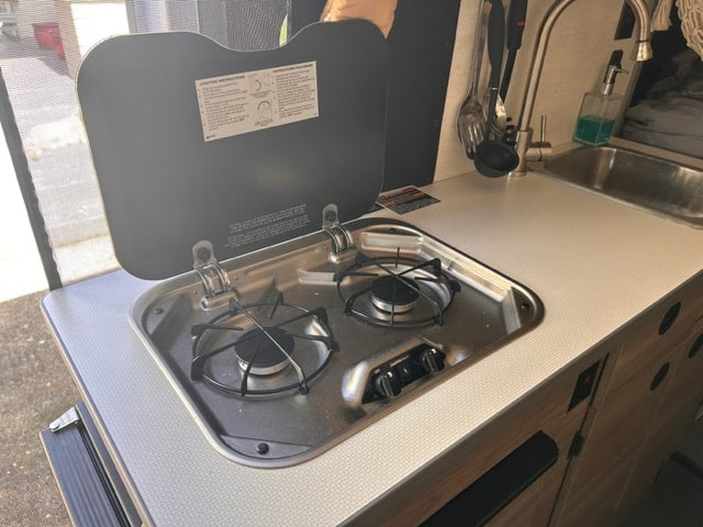  and practical overhead storage bins. Ready for your adventure.|Inside your RV rental: view of the dashboard — photo 16
