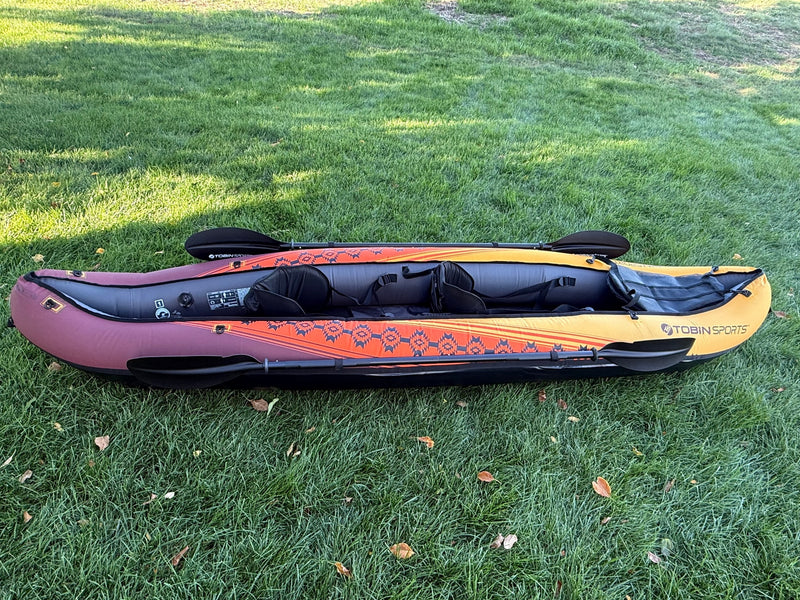 This colorful inflatable kayak, complete with paddles, is ready for watersports fun on your next RV rental adventure! — photo 20