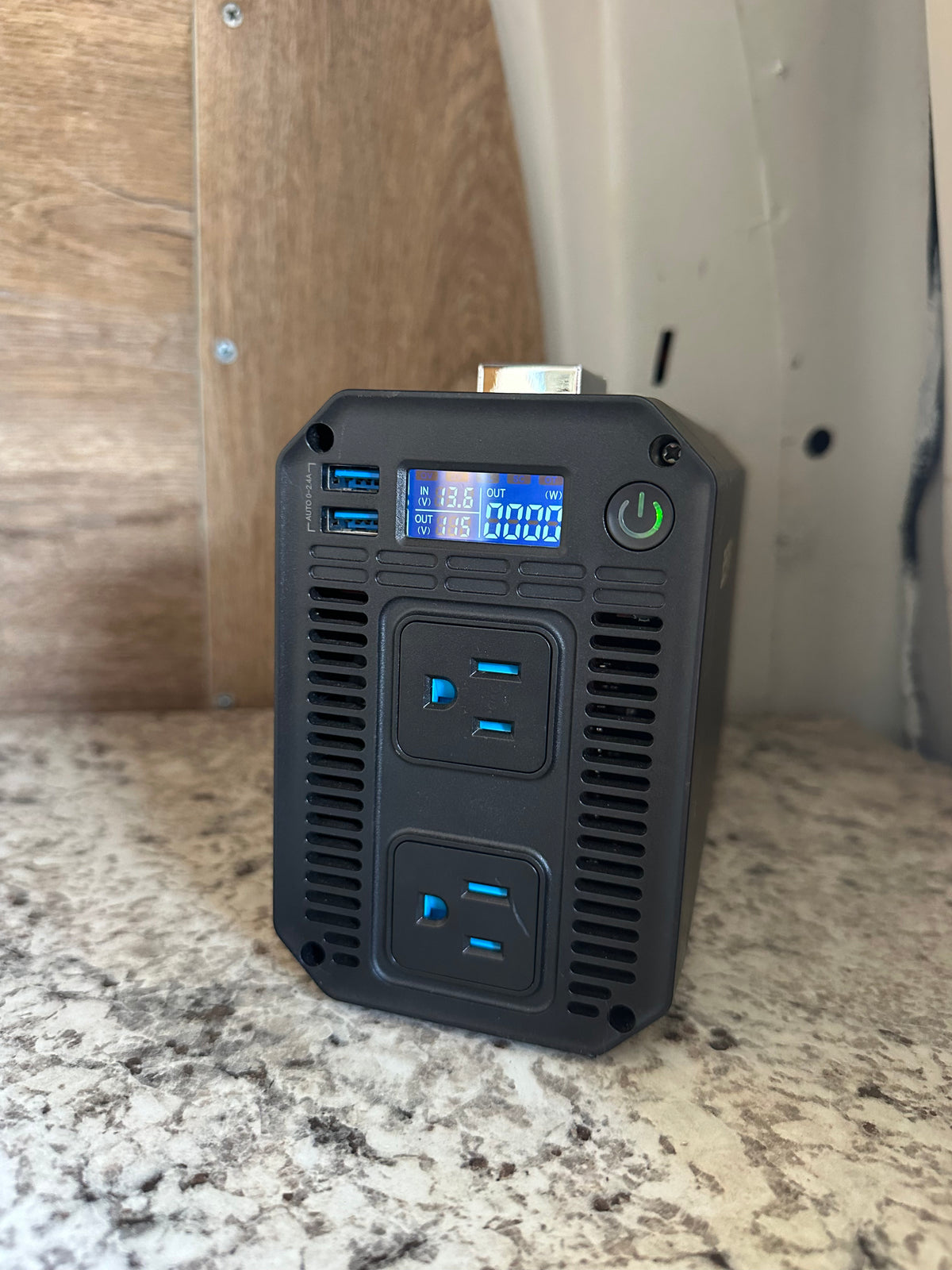 RV rental ready: Portable power station with 115V AC and USB ports for travel. Digital display shows 13.6V in, 115V out. — photo 19