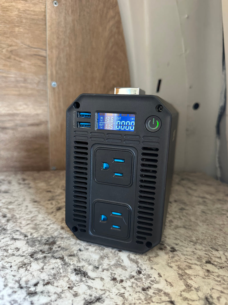 RV rental ready: Portable power station with 115V AC and USB ports for travel. Digital display shows 13.6V in, 115V out. — photo 19