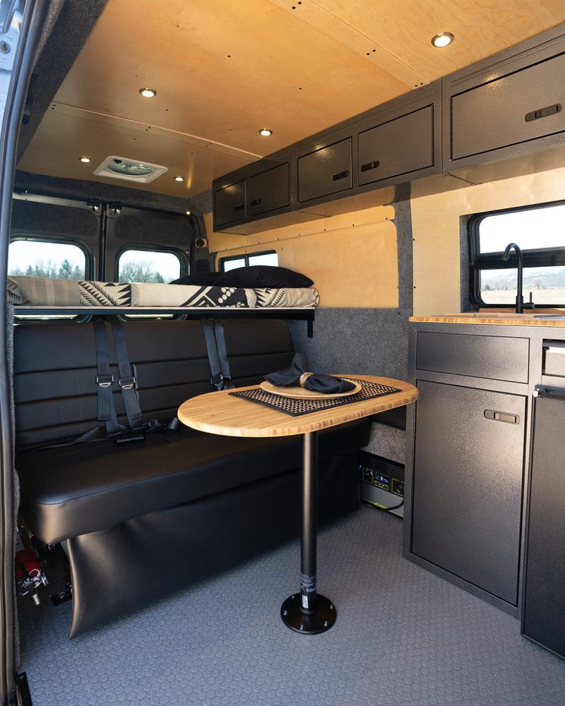  and a compact kitchen area in a modern camper van.|Inside an RV rental: a modern camper van kitchen with a sink — photo 9