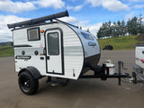 This Sunray Sport teardrop RV rental is a compact travel trailer with off-road tires and an awning, ready for adventure.