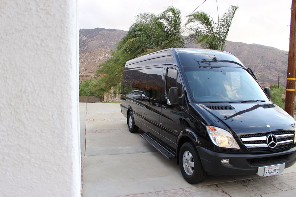 Black Mercedes-Benz Sprinter van