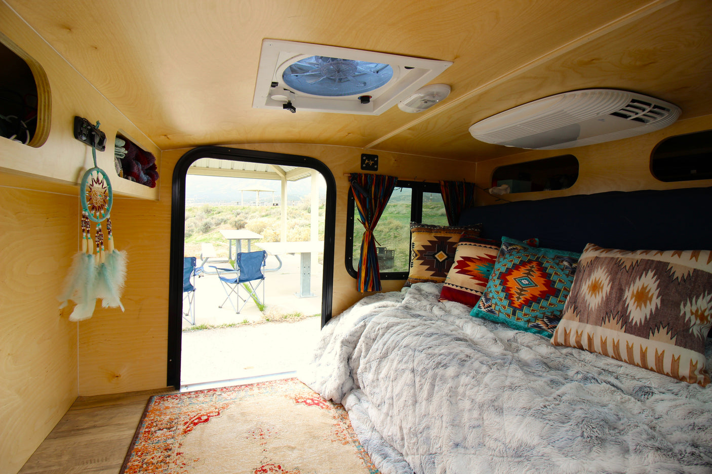 Step inside this cozy teardrop trailer, featuring a fluffy bed, Southwestern charm, and an inviting view of the outdoors. The couch folds into a soft double bed that is comfortable for people up to 6'3" in height. 