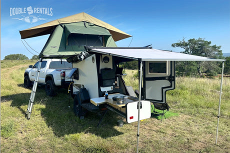 Overland rv rental: Equipped Toyota Tacoma with rooftop tent & Taxa TigerMoth off-road trailer. Outdoor kitchen, ideal for camping.