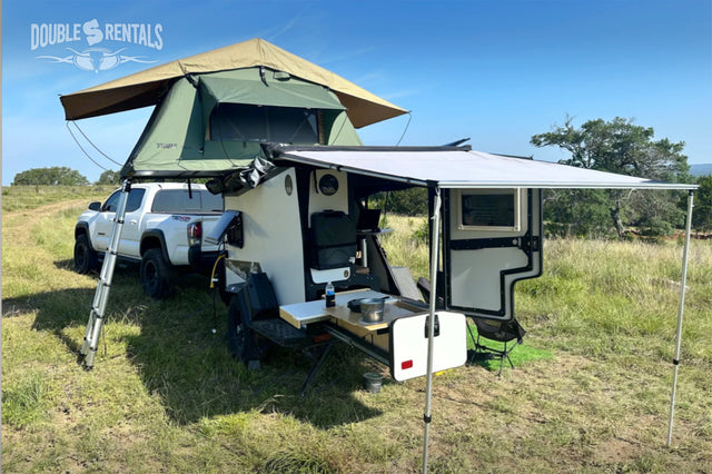 Overland rv rental: Equipped Toyota Tacoma with rooftop tent & Taxa TigerMoth off-road trailer. Outdoor kitchen, ideal for camping.