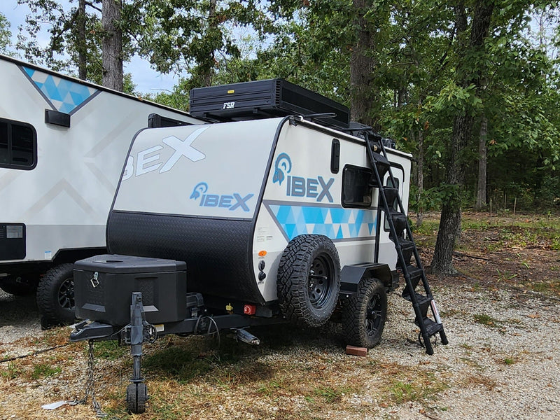  wooded campsite.|Night camping: an RV rental with a glowing rooftop tent — photo 5