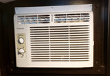 Frigidaire RV air conditioner controls (temperature, fan, mode) for cooling comfort in an RV rental.