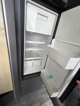 Empty & clean RV refrigerator, ready for stocking on your rv rental journey.