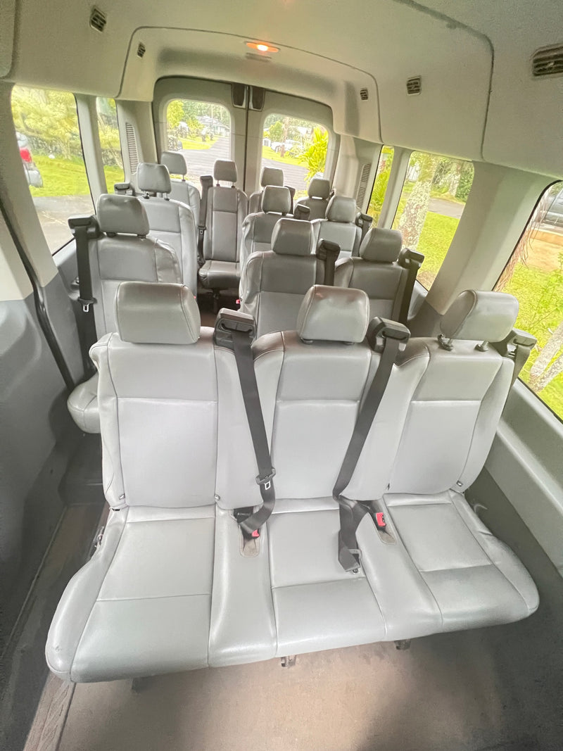  perfect for an rv rental trip.|Spacious passenger van interior with gray seats & bright lights. Ideal for group trips — photo 7