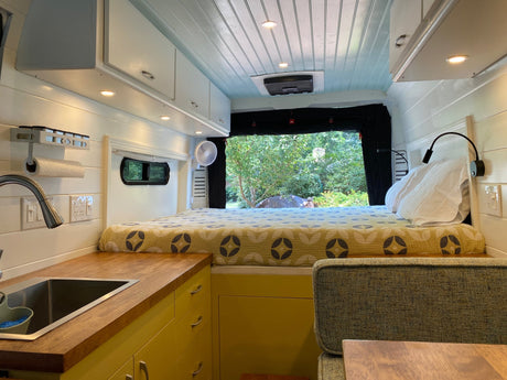  and wood floor. Steps for easy access.|Bright RV rental interior: wood counters