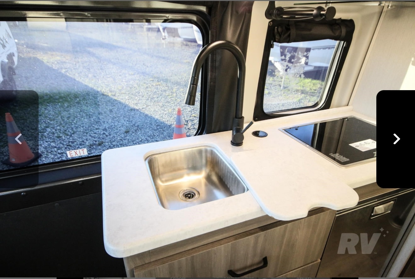  and dinette seating.|Inside an RV rental: view of front cabin — photo 8