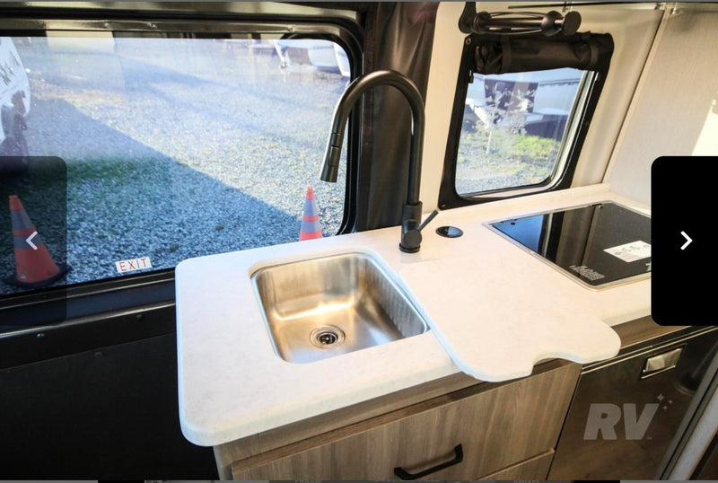  and dinette seating.|Inside an RV rental: view of front cabin — photo 8
