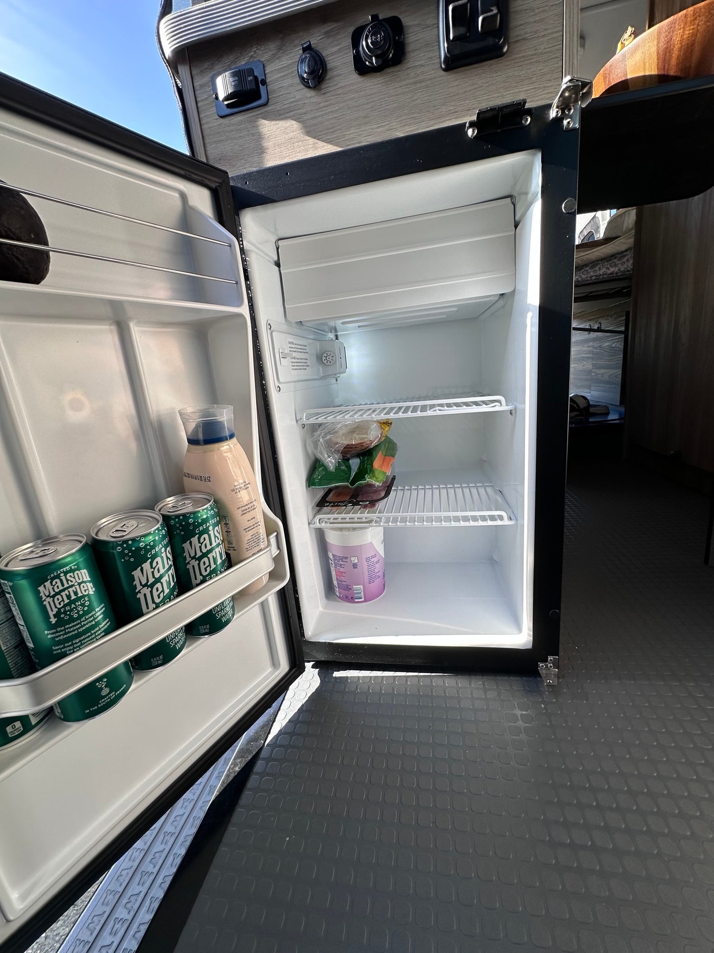  and ample storage for adventure.|RV rental kitchen with a two-burner stove — photo 11