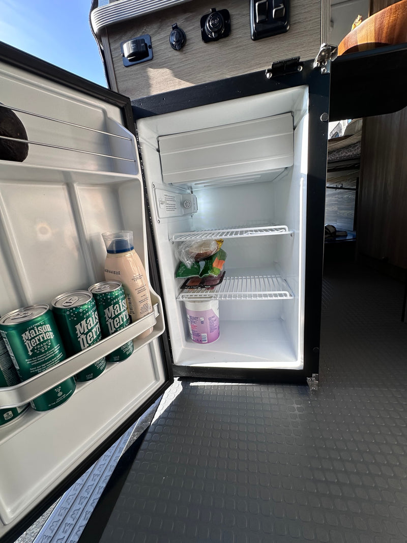  and ample storage for adventure.|RV rental kitchen with a two-burner stove — photo 11