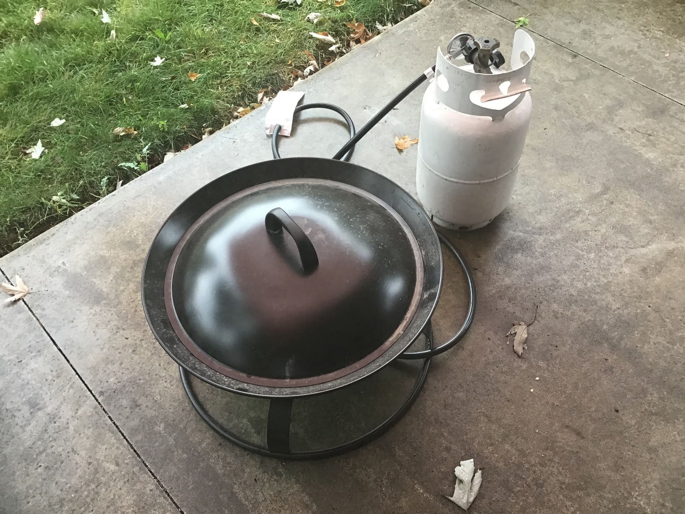 Outdoor propane fire pit setup, perfect for cozy rv rental camping nights or patio warmth. — photo 16