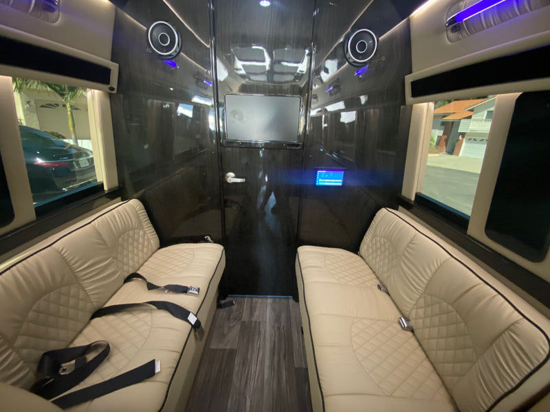  ideal for travel.|Compact RV rental interior with toilet — photo 4
