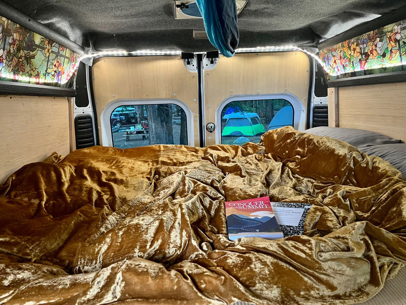  and golden velvet fabric.|Cozy RV rental bed with gold blanket — photo 13
