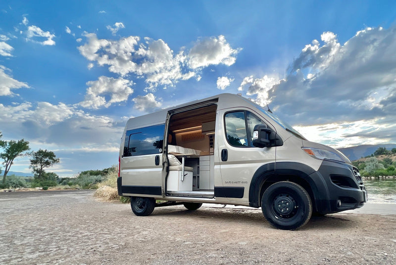  and a large window with an outdoor view.|This rv rental interior features custom open drawers — photo 5