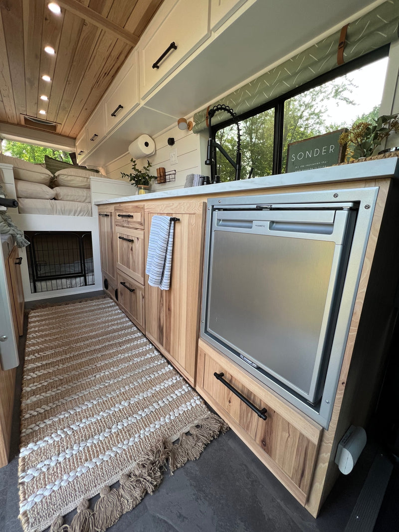  and a clever Lagun table setup. Perfect home on wheels.|Inside a stylish rv rental: natural wood and white tones create a cozy — photo 4