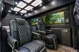 Step into luxury with this RV rental's custom black leather interior, featuring diamond-stitched seats and ambient lighting.
