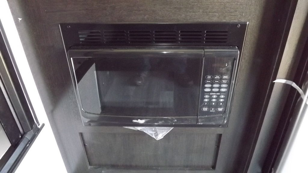  and control panel. Efficient space usage.|Compact stainless steel sink — photo 9