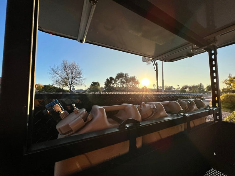 RV rental cargo view at sunrise: water/fuel containers securely stored. Essential gear for adventure travel. — photo 16