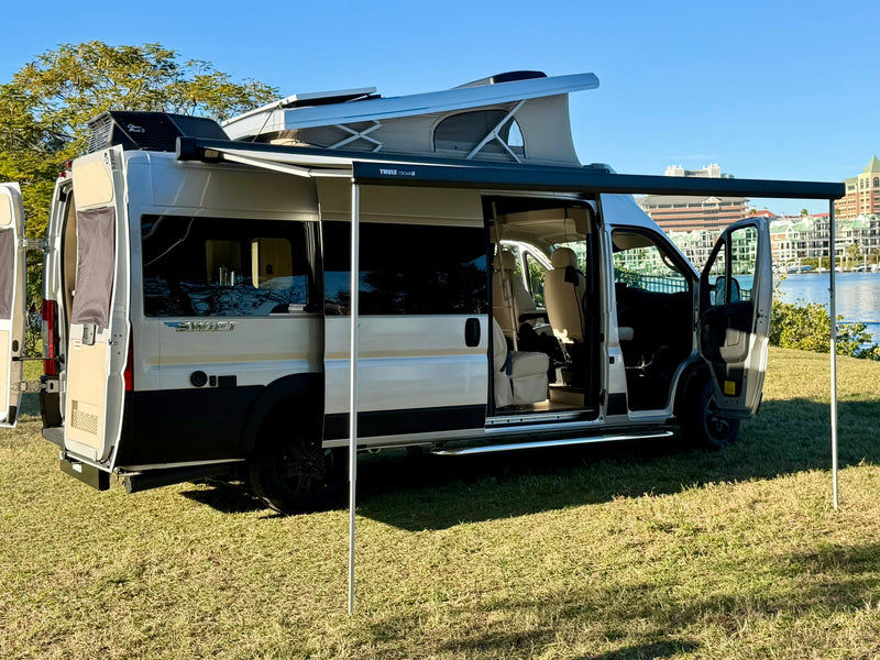 Modern rv rental camper van with pop-top roof — photo 1