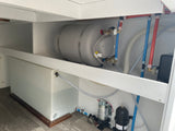 RV rental water system: fresh water tank, water heater, pump, & PEX plumbing in a compact setup.