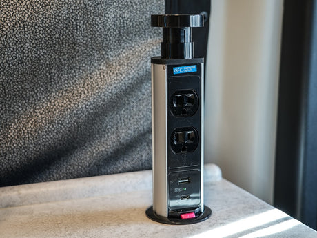 This pop-up power outlet tower with GFCI, USB-A, and USB-C ports is a convenient feature in an RV rental.