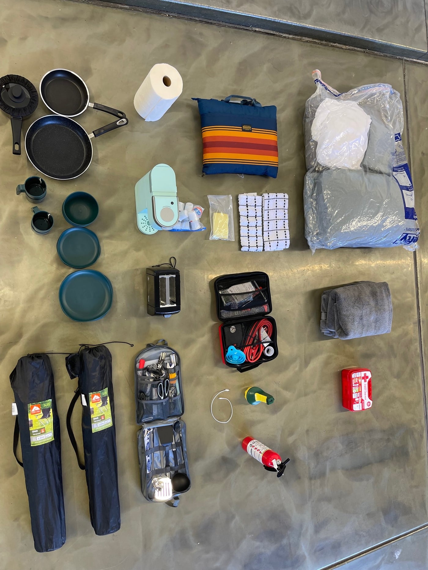  and a colorful rug.|RV rental outdoor kitchen featuring a Keurig coffee maker — photo 13